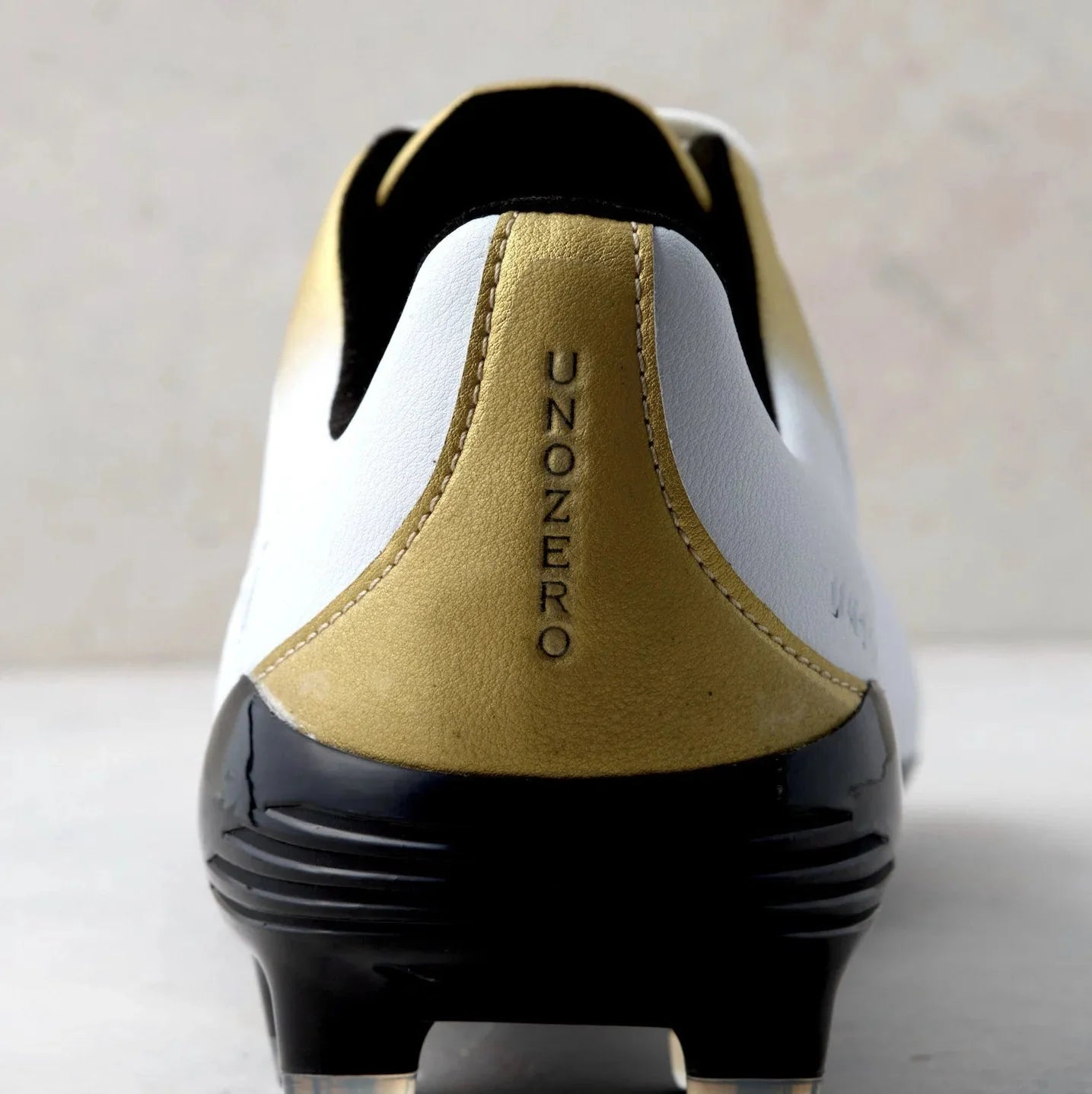 Unozero Aventto FG Firm Ground Soccer Cleats White