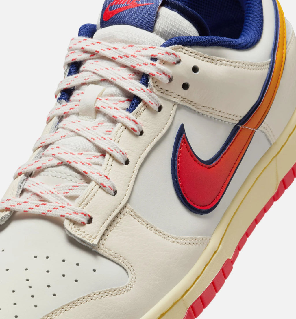 Dunk Low Retro SE Mens Lifestyle Shoe Pale Ivory Light Crimson Sail University Gold Blue Void Sail